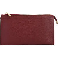 Photo shows the burgundy color with product being  used as a clutch.  The wristlet and over the shoulder strap are inside the bag (not shown in this pic)